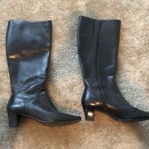 Tall black leather boots